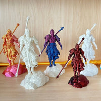 Collection of colorful figurines on a wooden surface